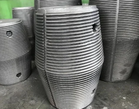 Threaded biconical graphite electrode nipples standing on a workshop floor